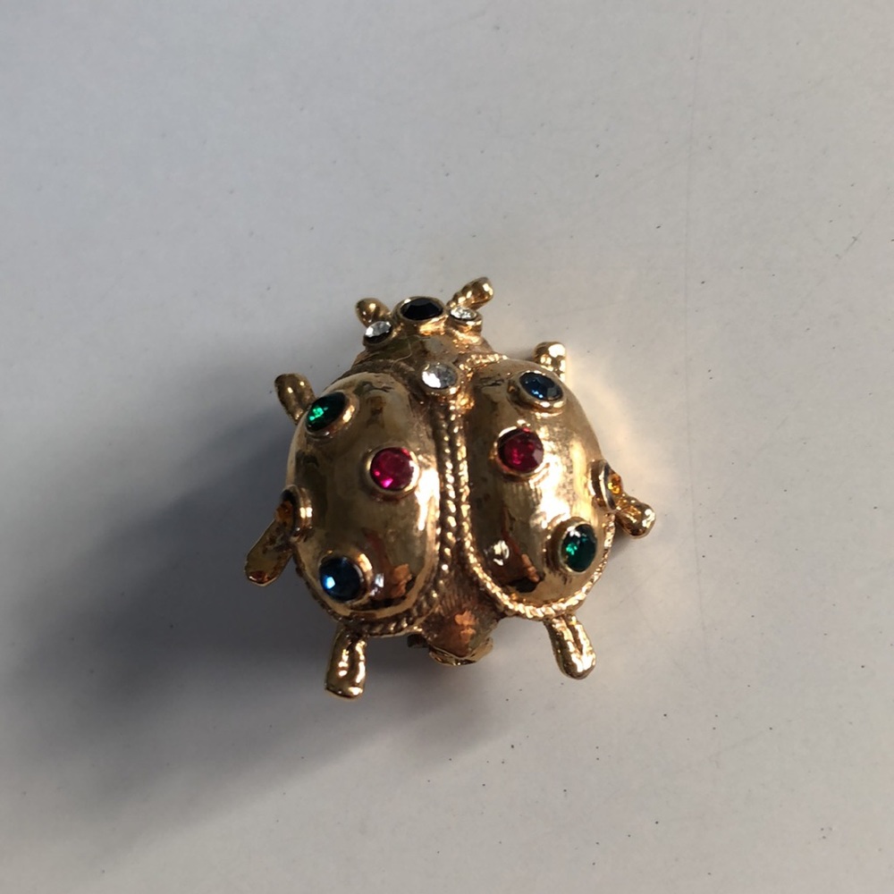 Bejeweled gold ladybug brooch